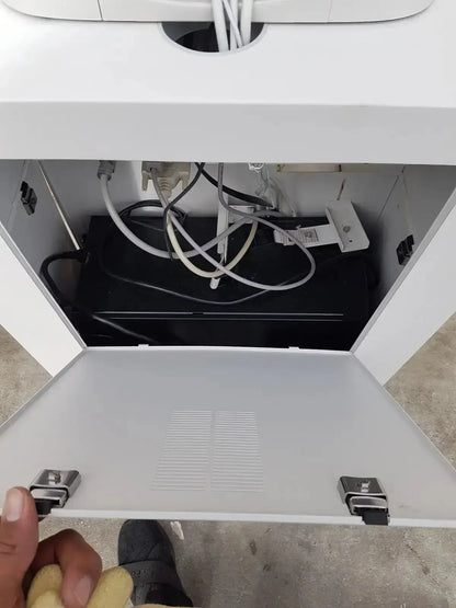 White plastic series ii lhs vascular cart cabinet with open door showing organized cables and black device inside multilab series
