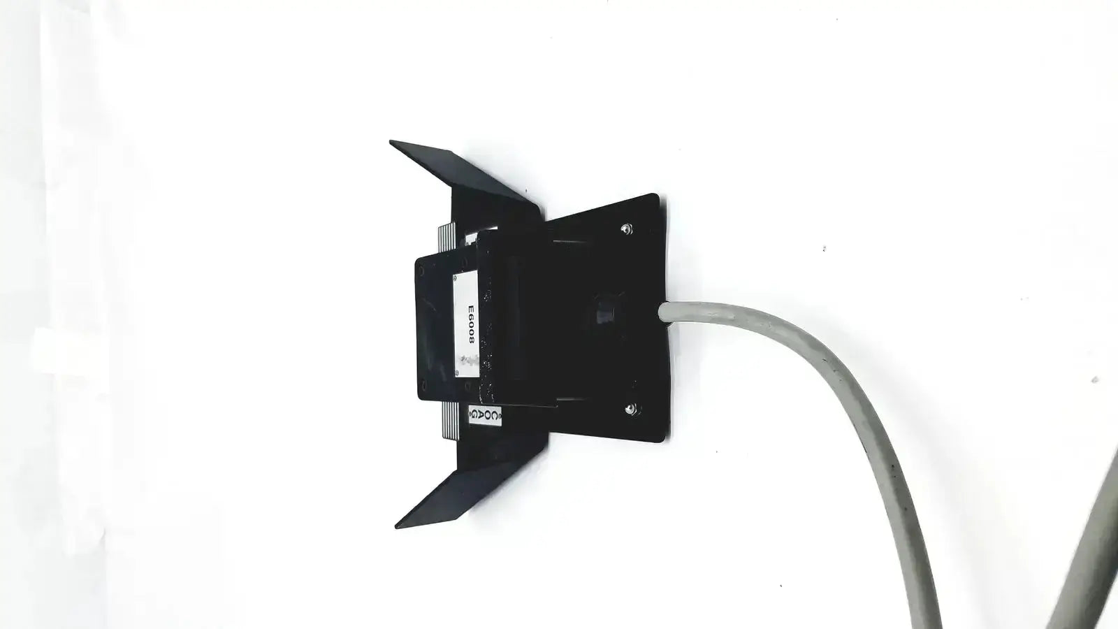 Black valleylab covidien e6008 electrosurgical monopolar footswitch with gray side cable wall-mounted camera view