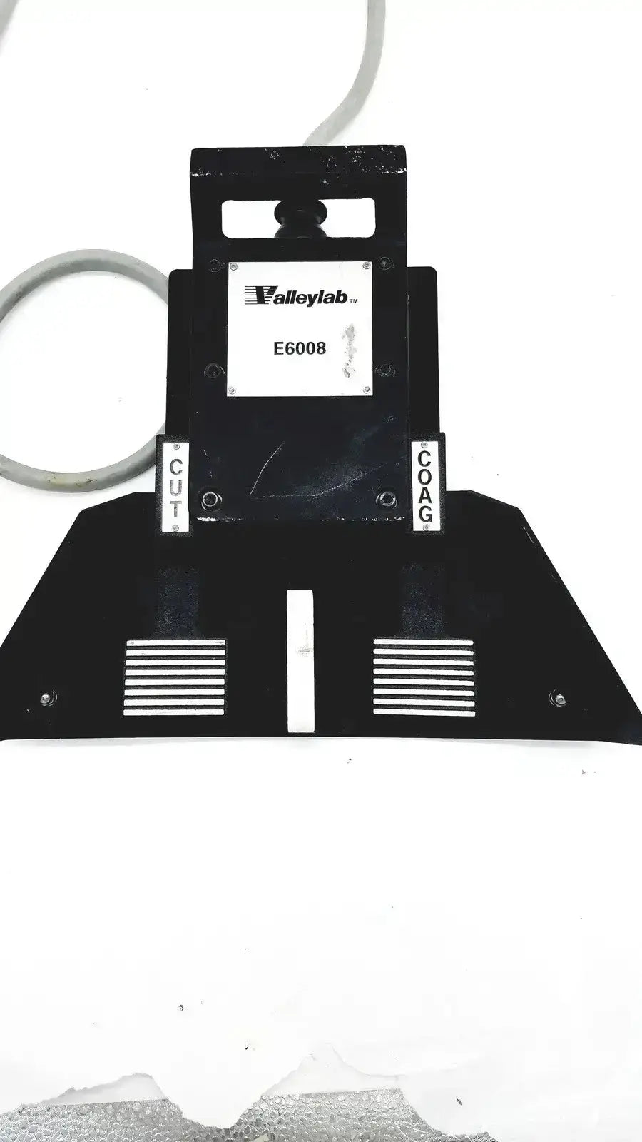 Black valleylab covidien e6008 electrosurgical monopolar footswitch with labeled cut and coat sections for precise control