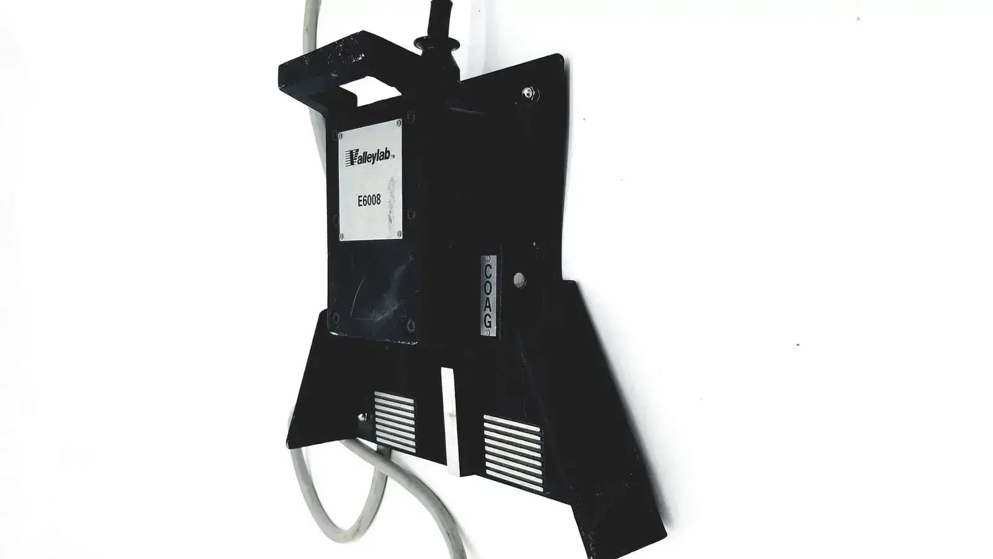 Black metal wall-mounted valleylab covidien e6008 electrosurgical monopolar footswitch with coag label
