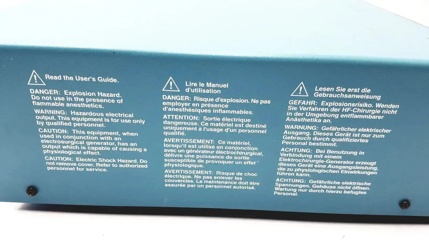 Blue rectangular warning label with multilingual safety instructions on the valleylab force argon ii-20 gas delivery unit