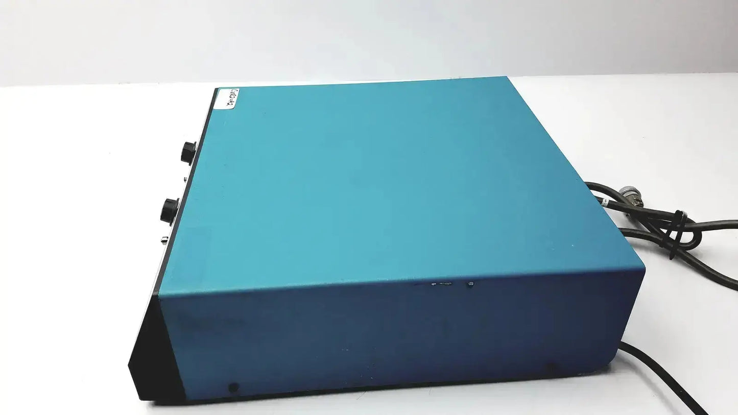 Teal-colored rectangular valleylab force argon ii-20 gas delivery unit with black knobs and power cord for gas delivery
