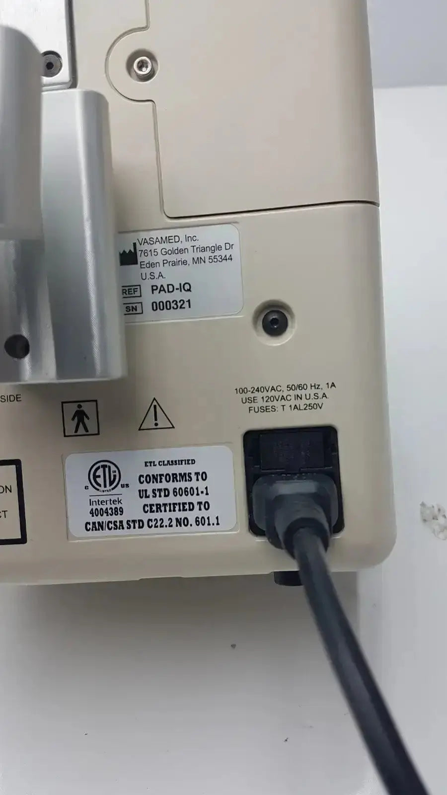Beige plastic vasamed sensilase pressure testing monitor with silver metallic parts and black power cord for accurate pressure testing