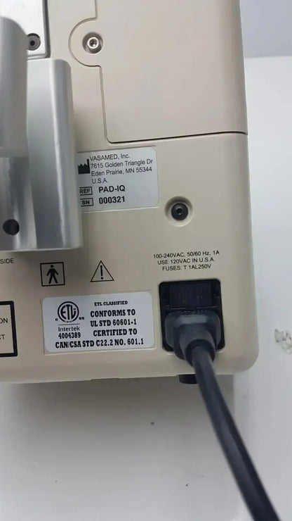 Beige plastic vasamed sensilase pressure testing monitor with silver metallic parts and black power cord for accurate pressure testing