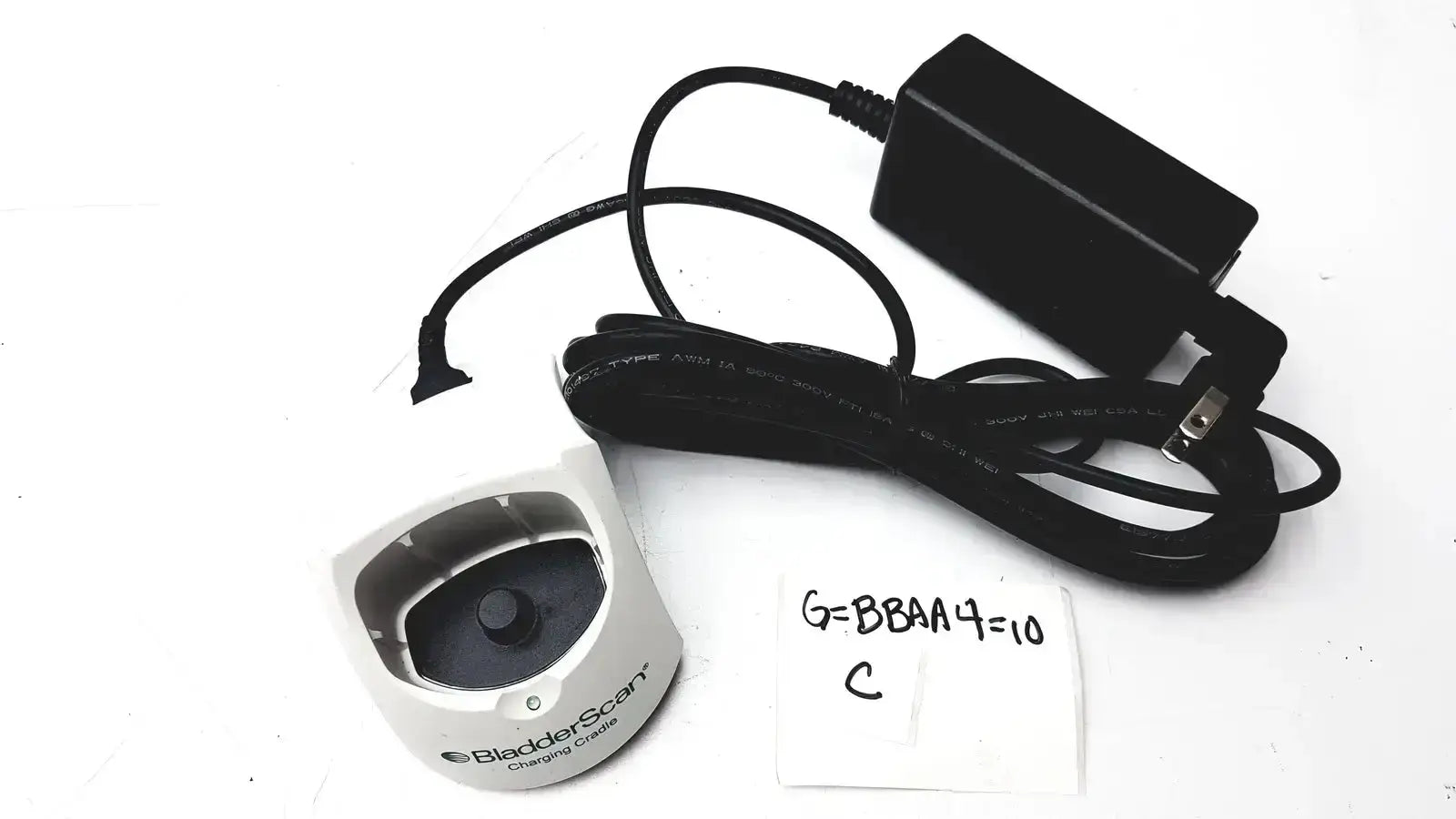White verathon 0570-0155 bladderscan charging cradle with black circular sensor and silver logo for bladderscan charging