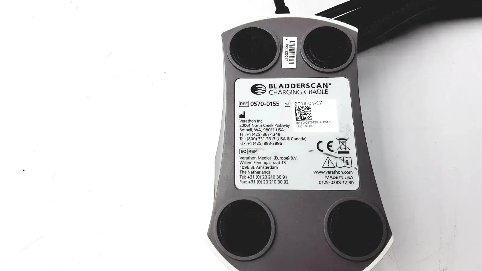 Gray and white Verathon 0570-0155 bladderScan charging cradle with black circular contact points for bladderScan charging