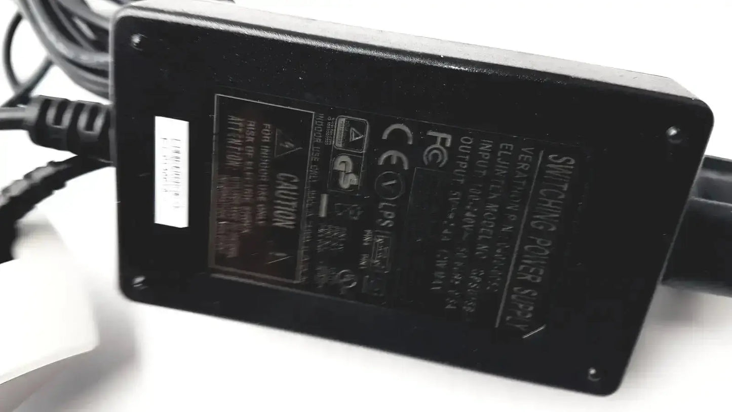 Black rectangular switching power supply with labels on the back for Verathon 0570-0155 BladderScan charging cradle