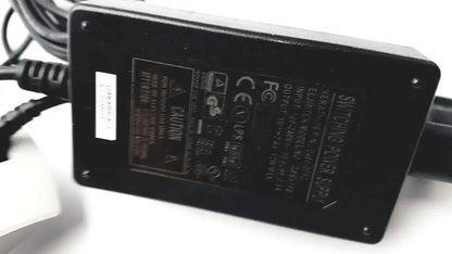 Black rectangular switching power supply with labels on the back for Verathon 0570-0155 BladderScan charging cradle
