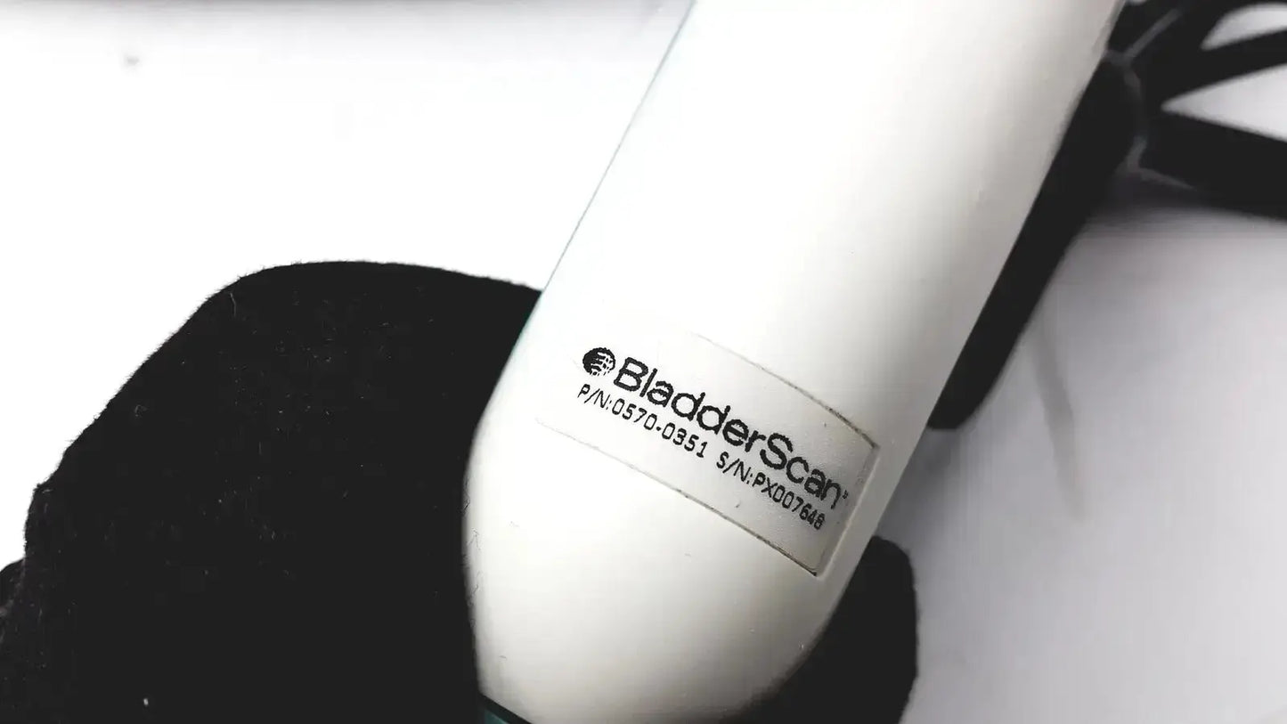 White verathon bladderscan bvi ultrasound device with cylindrical body and black cable for bladder imaging