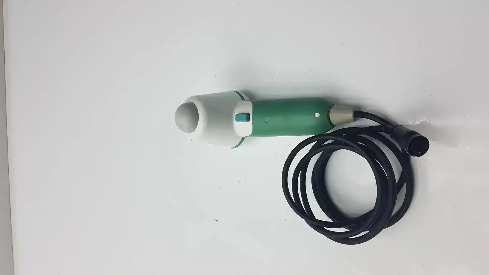Green and white verathon bladderscan model 0570-351 with probe and coiled black cable for medical use