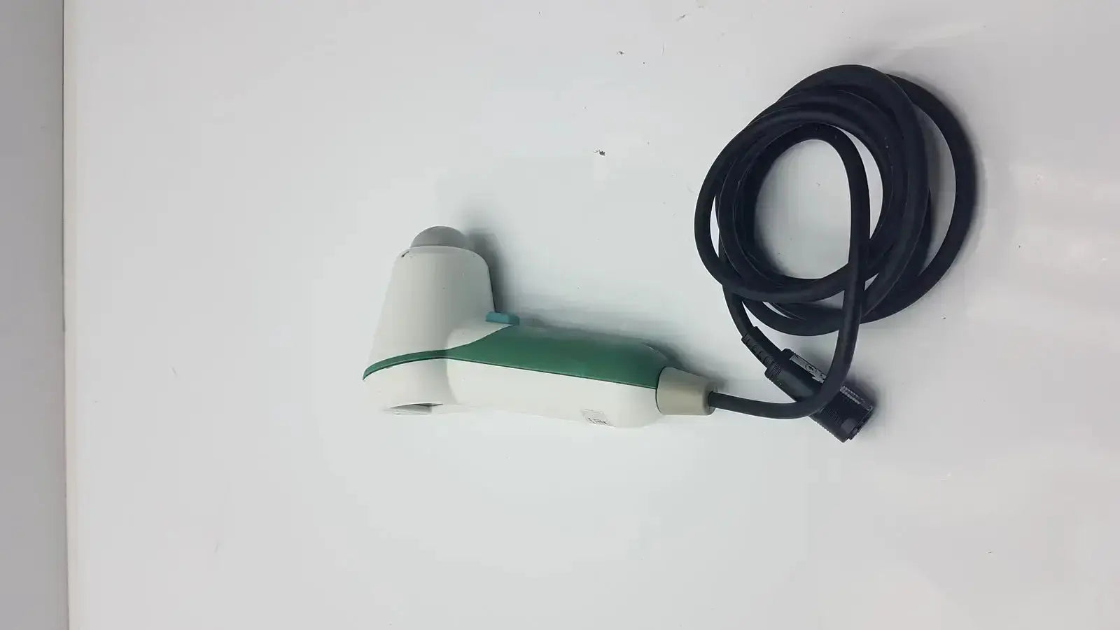 White and green handheld verathon bladderscan model 0570-351 with black coiled cable and attached probe
