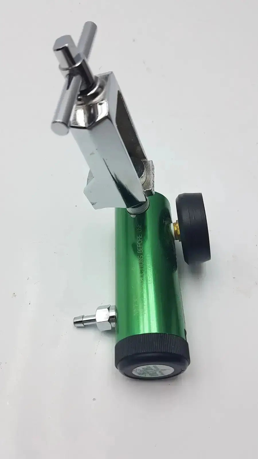 Green cylindrical victor medical air pressure regulator with chrome fittings and black knob model fs ii 8y cgA 870
