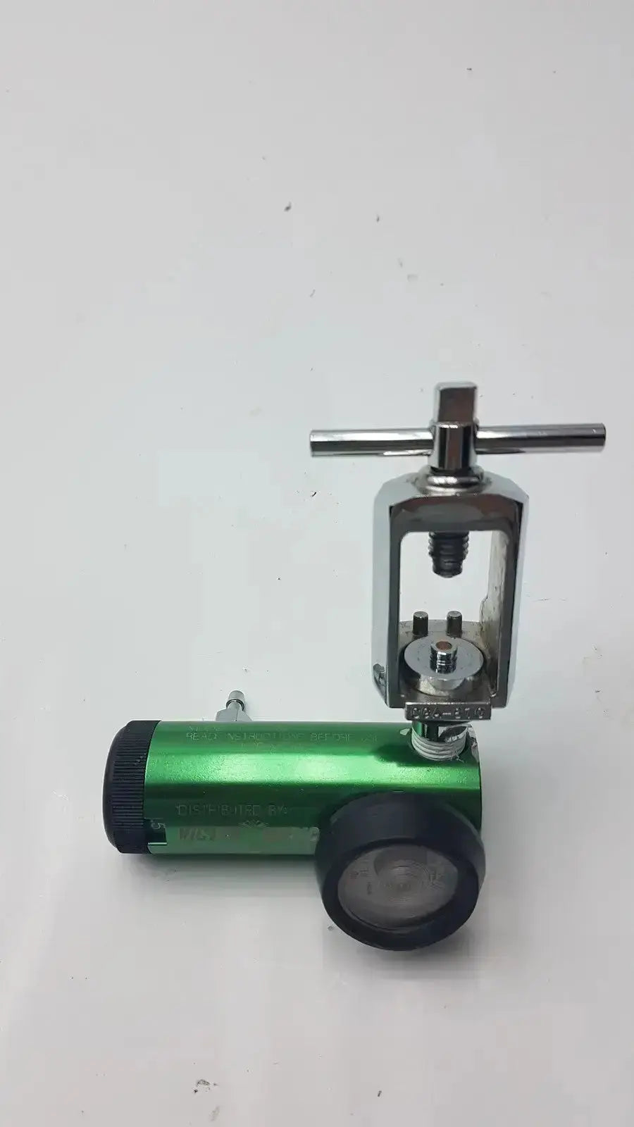 Victor medical air pressure regulator model FS II 8Y with green body chrome knob and black rubber caps for medical air