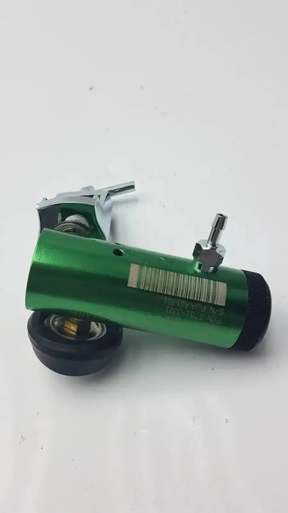 Green cylindrical victor medical air pressure regulator with metallic fittings and black end caps model fs ii 8y