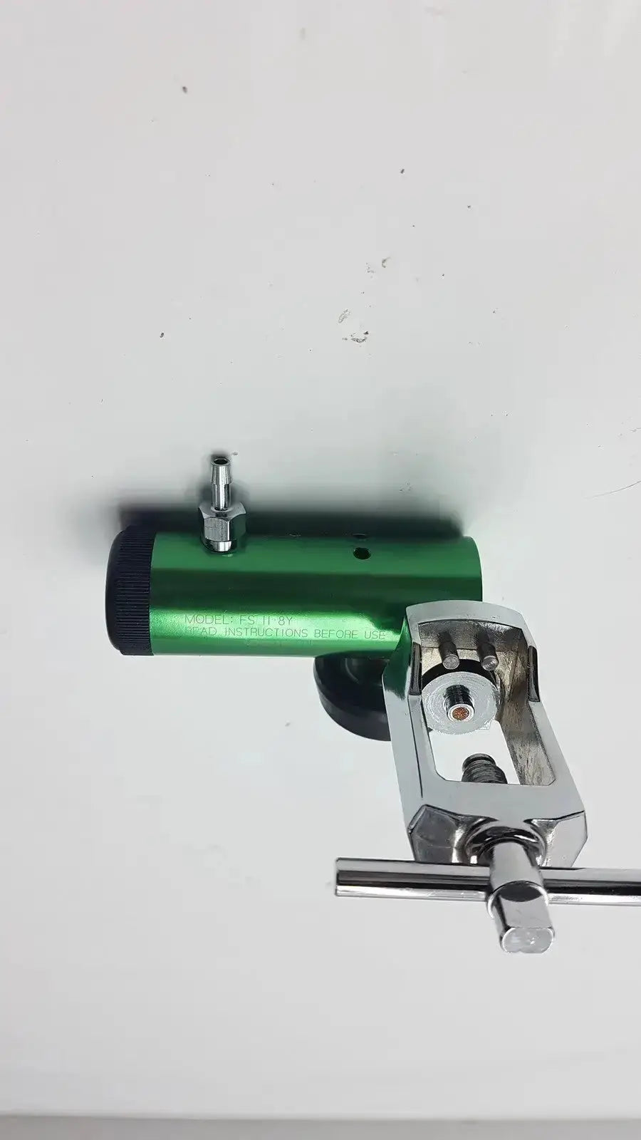 Victor medical air pressure regulator FS II 8Y is a green cylindrical medical air regulator with chrome fittings and a black knob