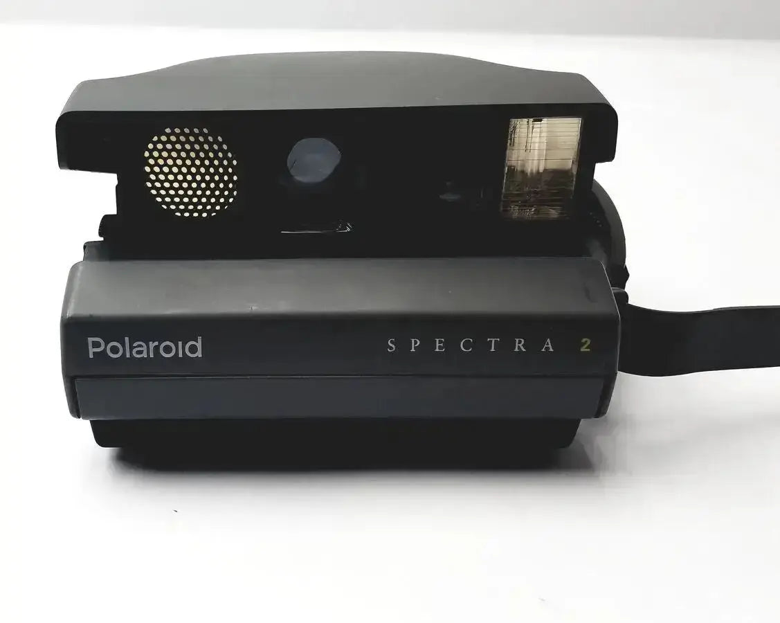 Black polaroid spectra 2 instant film camera with matte finish and built-in flash for vintage instant photography