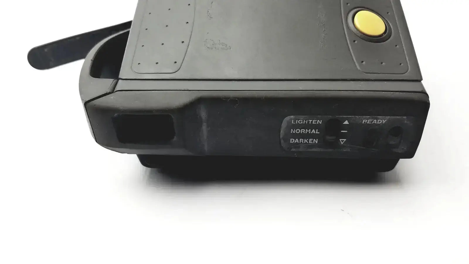 Black plastic polaroid spectra 2 instant film camera with yellow shutter button and three exposure setting dials untested