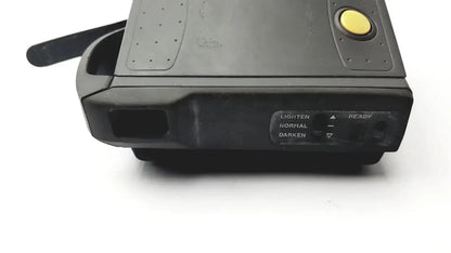 Black plastic polaroid spectra 2 instant film camera with yellow shutter button and three exposure setting dials untested