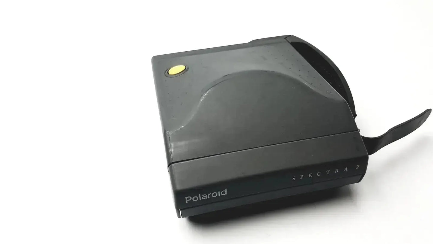 Black polaroid spectra 2 instant film camera with yellow button and black strap vintage untested model