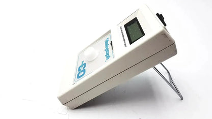 White plastic vitalograph breathco carbon monoxide monitor with digital display and black power switch for smoking cessation