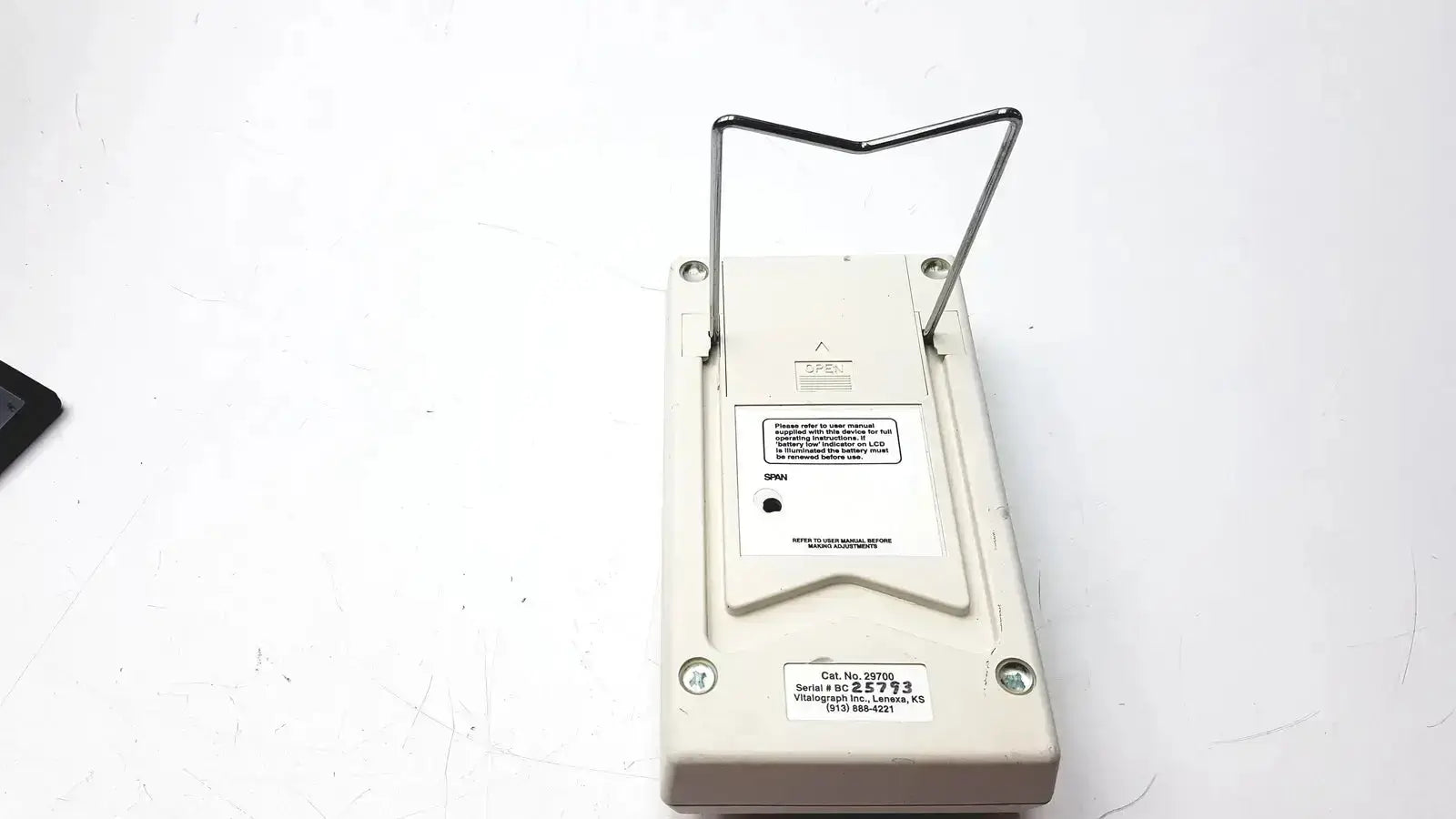 Beige plastic digital carbon monoxide monitor with metal stand vitalograph breathco for smoking cessation use