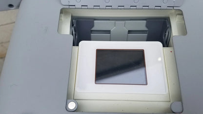 White rectangular slide tray with dark glass insert in light gray plastic machine for volcano s5 intravascular ultrasound medical equipment