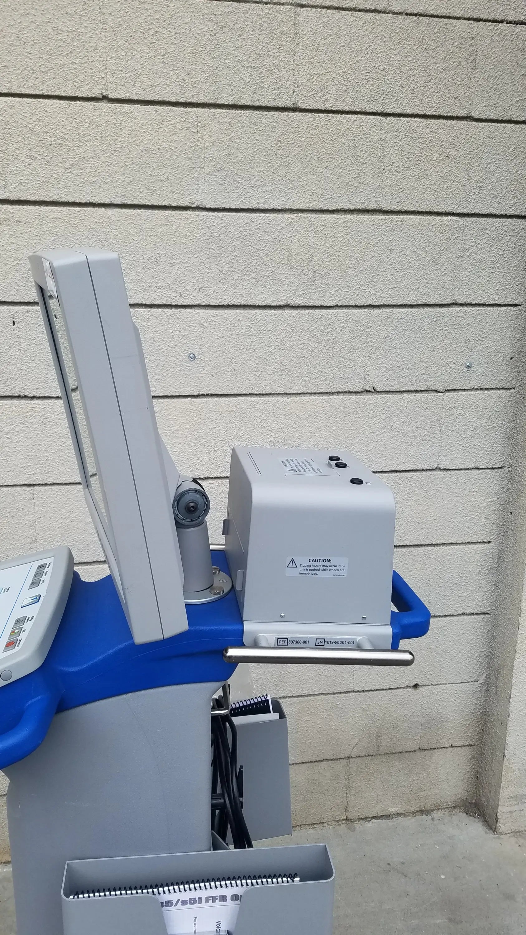 Gray and blue Volcano S5 intravascular ultrasound medical equipment with monitor, control panel, and attached reuse medical equipment