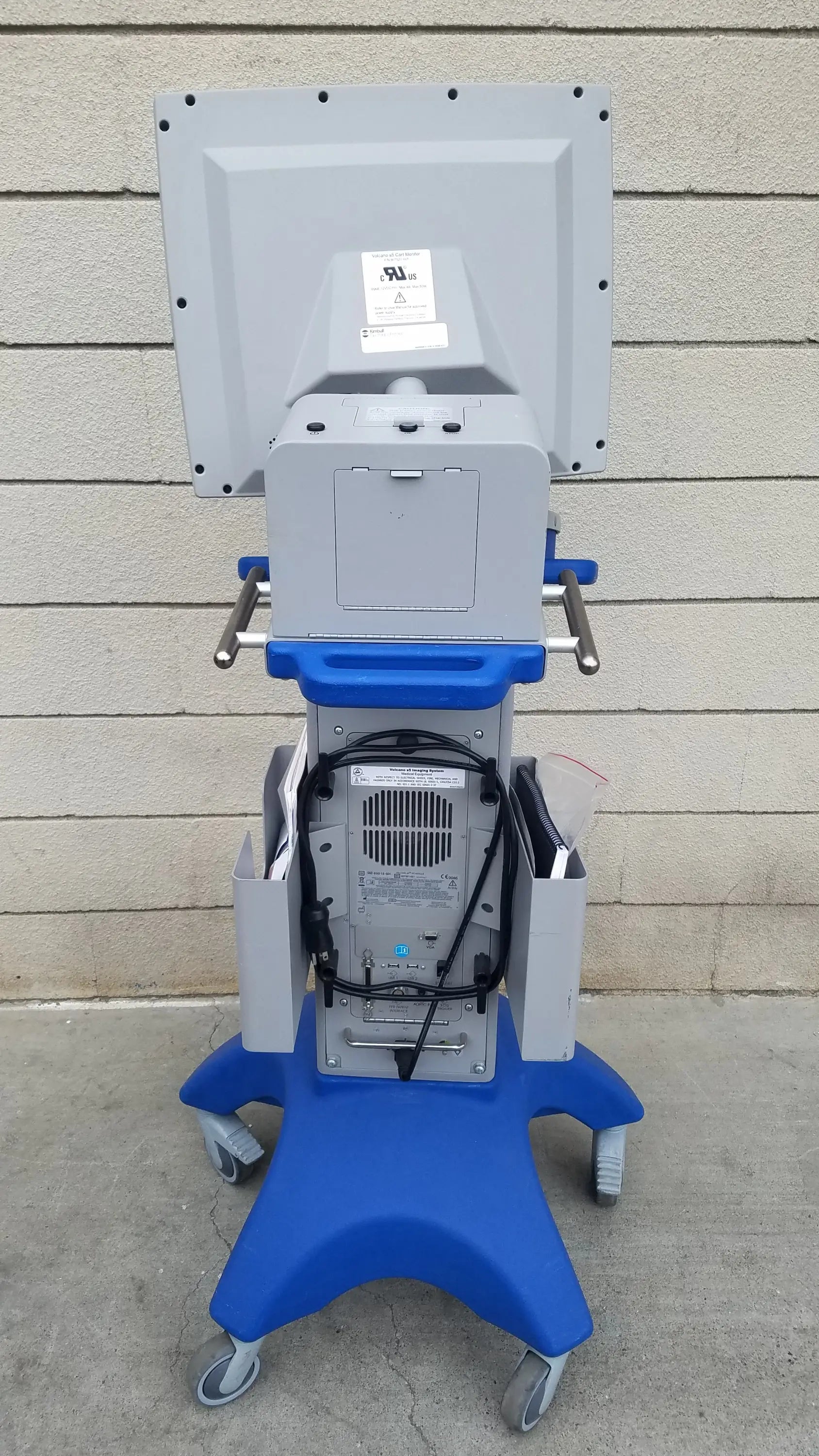 Blue and gray volcano s5 intravascular ultrasound imaging system medical equipment cart with monitor and cable management compartments