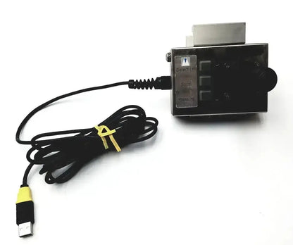 Black rectangular volcano s5i s5ige controller joystick with usb cable labeled buttons and metallic component on top