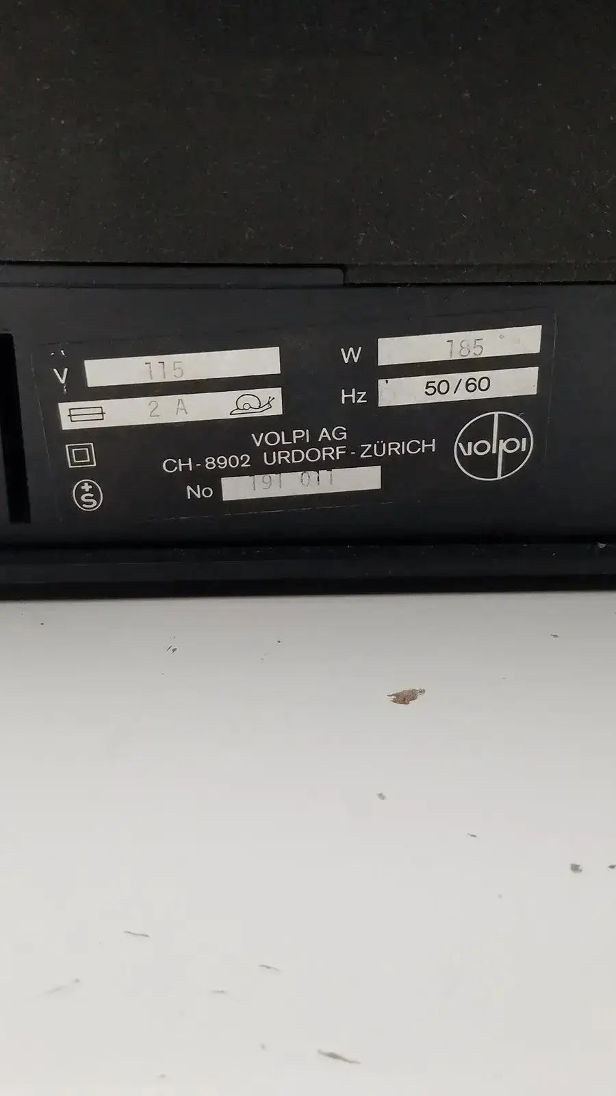 Black volpi intralux 6000 light source power supply unit with white label showing 115v 185w electrical specifications