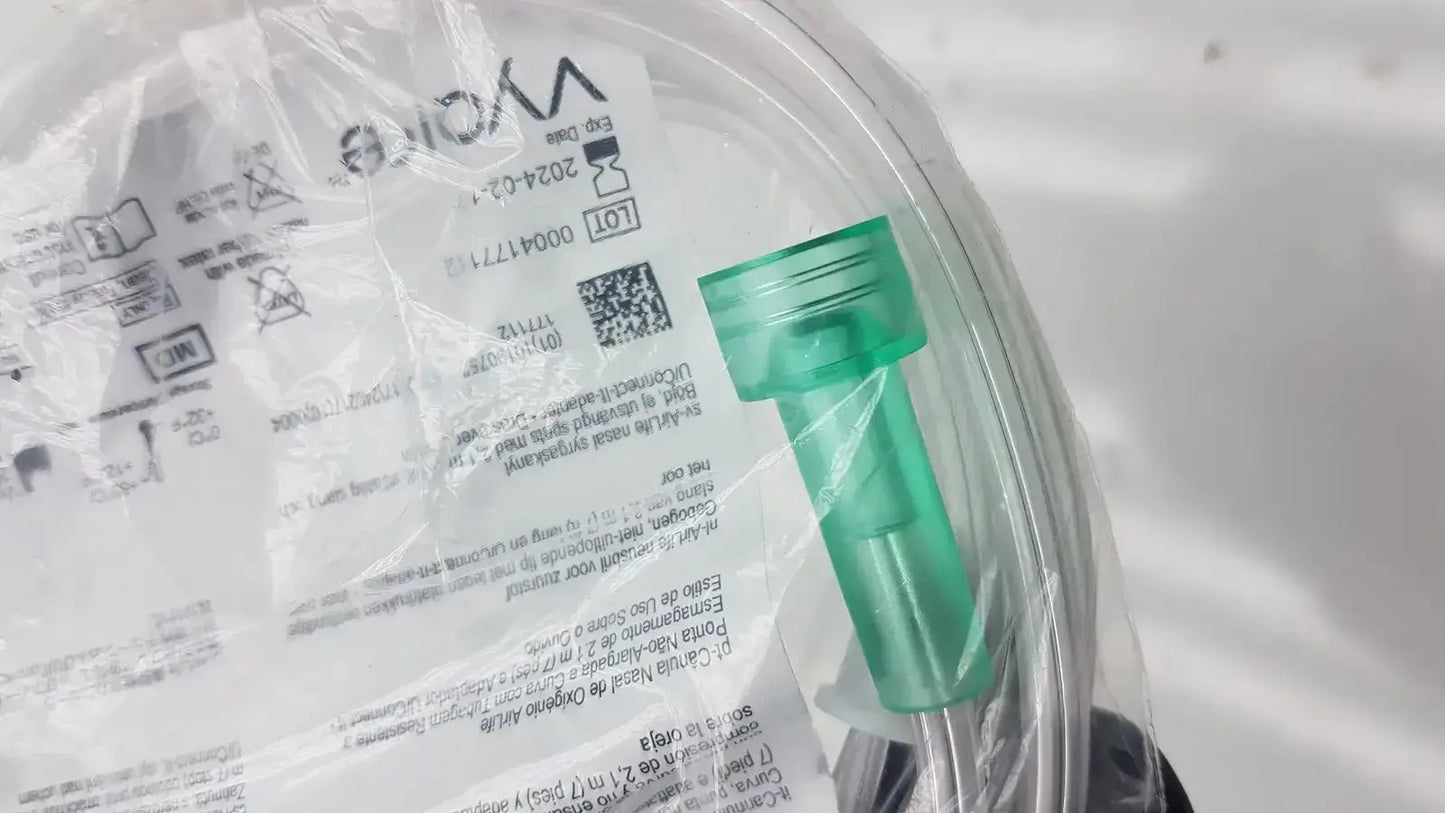 Green plastic oxygen cannula with clear transparent packaging and printed labels for vyaire mask oxygen use