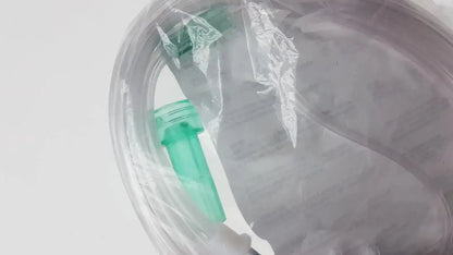 Clear plastic vyaire mask oxygen cannula with green tubing and connectors for medical respiratory use