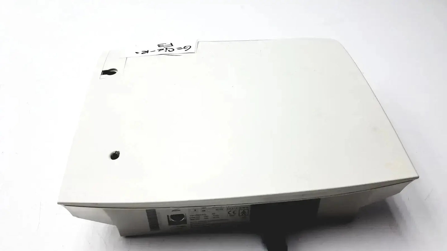 White plastic Epson projector with matte finish and side ventilation slots for Astra Tech handpiece unit used medical equipment for sale