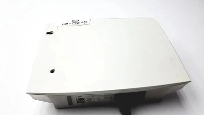 White plastic Epson projector with matte finish and side ventilation slots for Astra Tech handpiece unit used medical equipment for sale