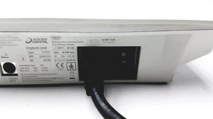 White astra tech dental handpiece unit with black power cord and technical labeling on rear panel used medical equipment for sale