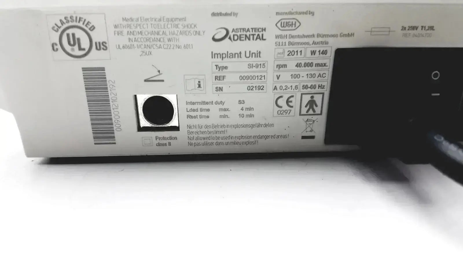 White plastic astra tech si-915 dental handpiece unit with black printed labels used medical equipment for sale