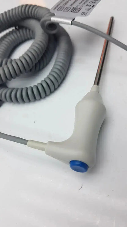 Gray coiled cable connected to a white plastic handle with blue button and metallic probe for welch allyn oral temperature probe