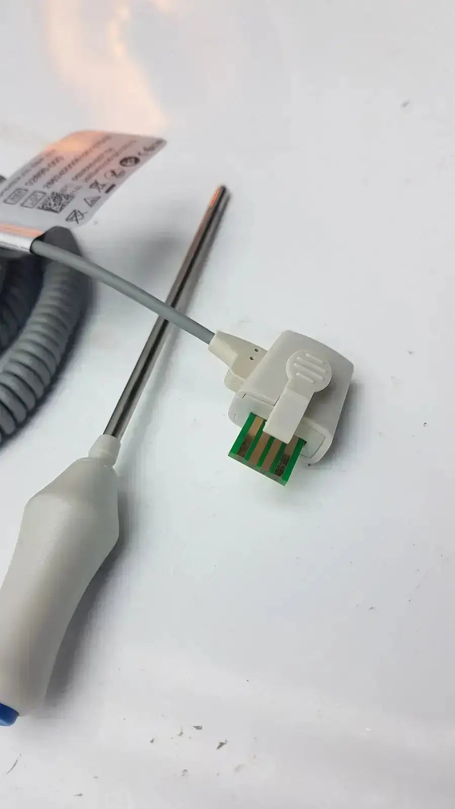 Welch Allyn 02895-000 white plastic oral temperature probe with green circuit board and metallic tip for oral temperature measurement