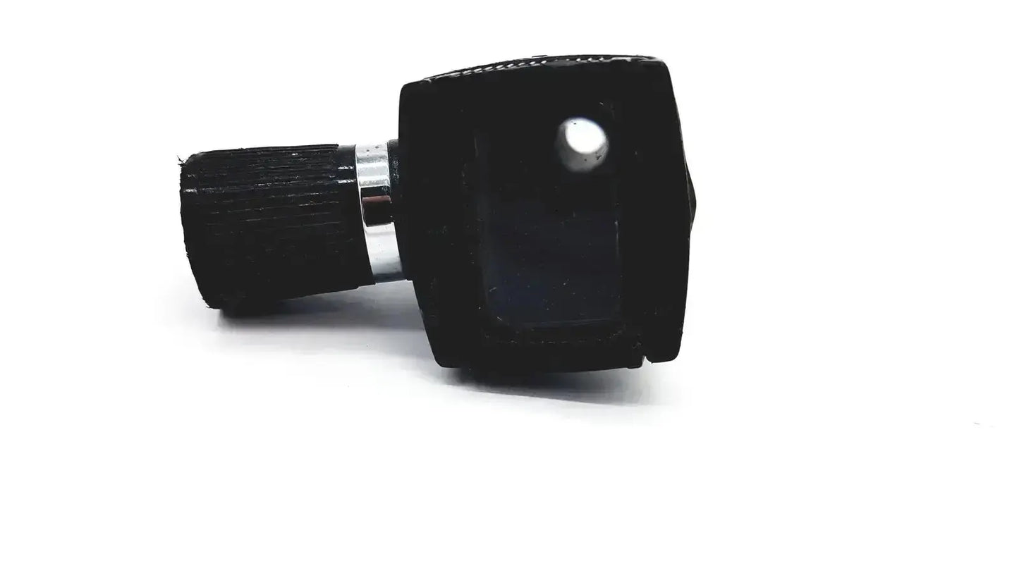 Black rubberized grip otoscope ophthalmoscope head with metallic silver ring and circular lens for medical use