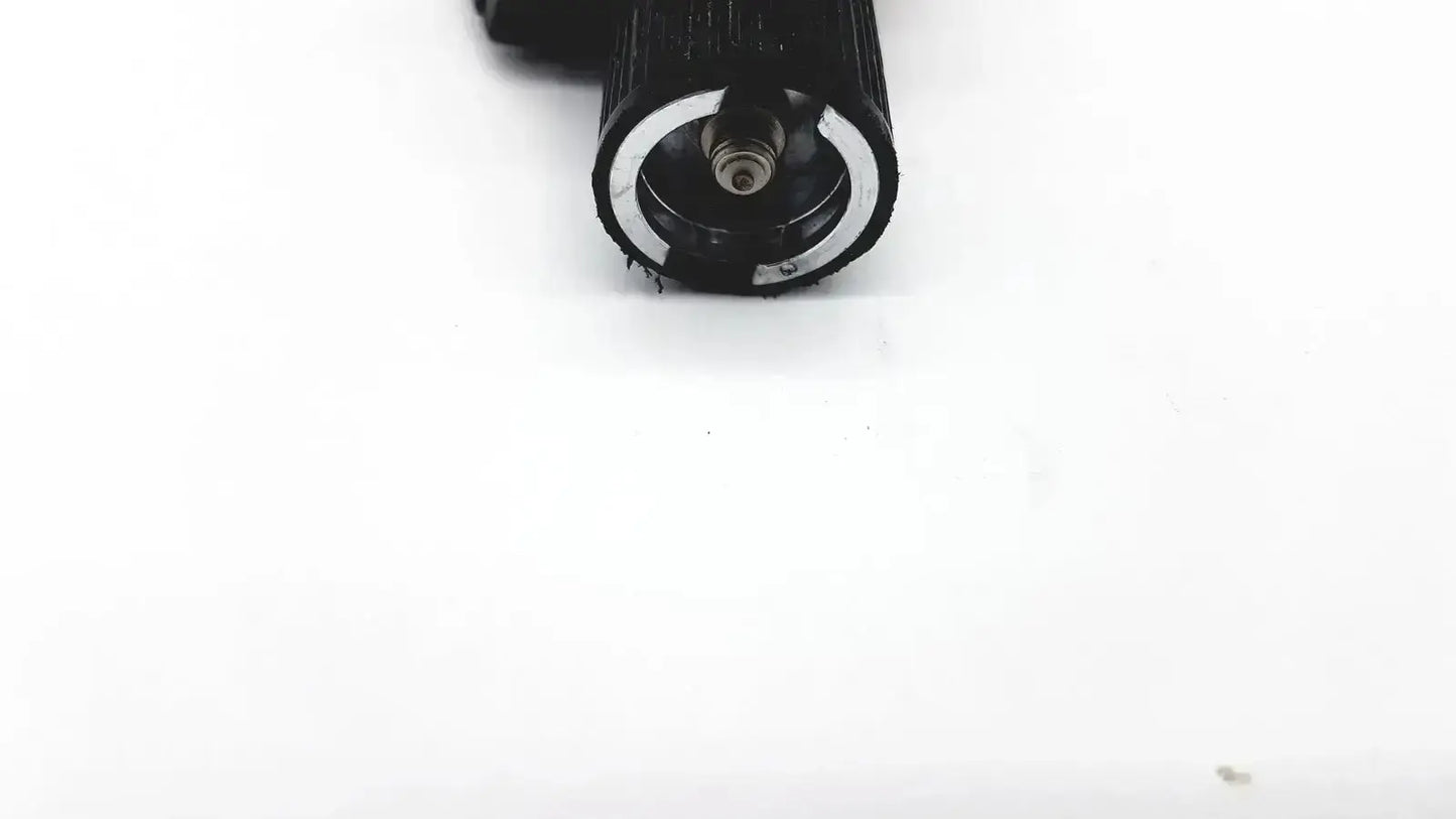 Black textured grip with silver metallic ring and screw on welch allyn 25020 3.5v otoscope ophthalmoscope head only