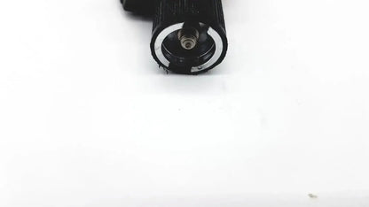 Black textured grip with silver metallic ring and screw on welch allyn 25020 3.5v otoscope ophthalmoscope head only