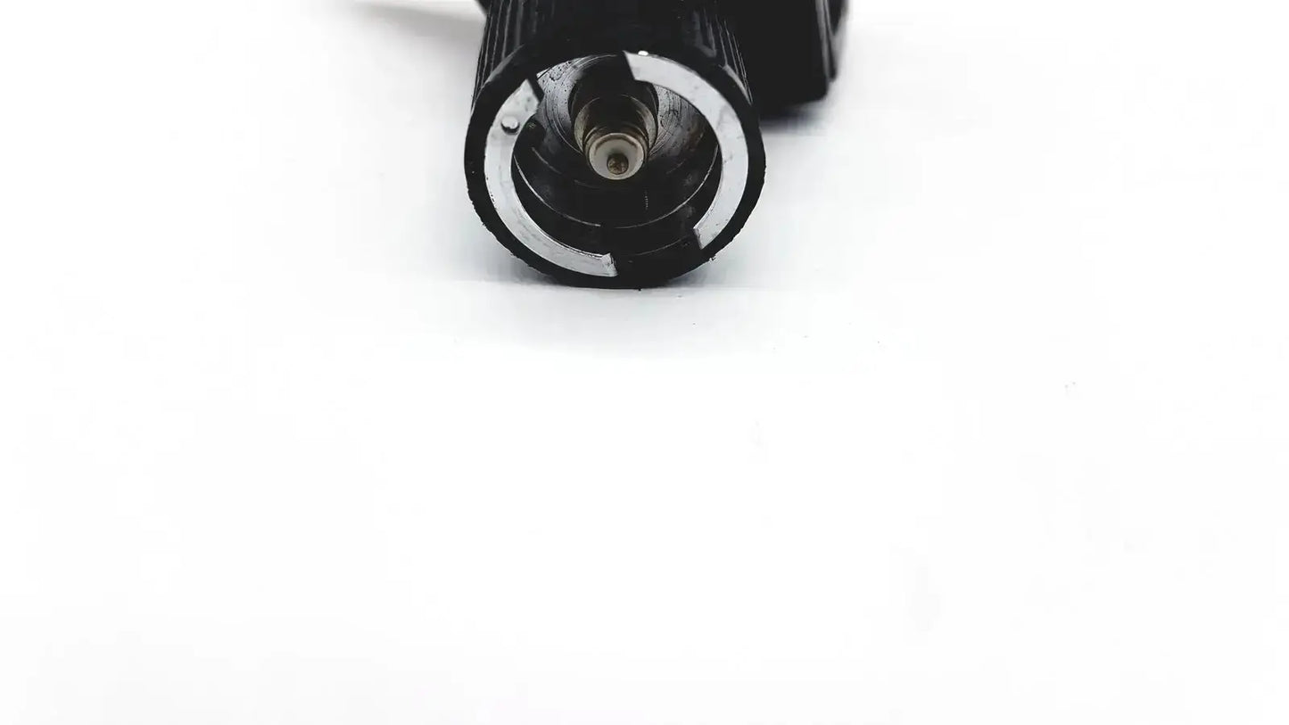 Black cylindrical Welch Allyn 25020 3.5V otoscope ophthalmoscope head with textured grip and metallic internal components