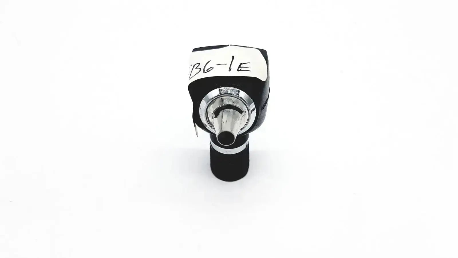 Black and silver welch allyn 25020 3.5v otoscope ophthalmoscope head with labeled white sticker on handle