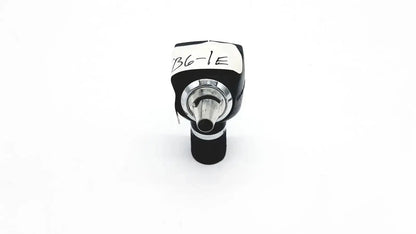 Black and silver welch allyn 25020 3.5v otoscope ophthalmoscope head with labeled white sticker on handle