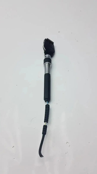 Welch allyn 3.5v ophthalmoscope head with black silver textured grip handle and flexible rubber cable from hospital surplus