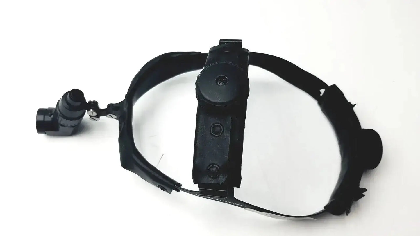Black welch allyn surgical headlight assy with adjustable strap and articulated arm for precise illumination
