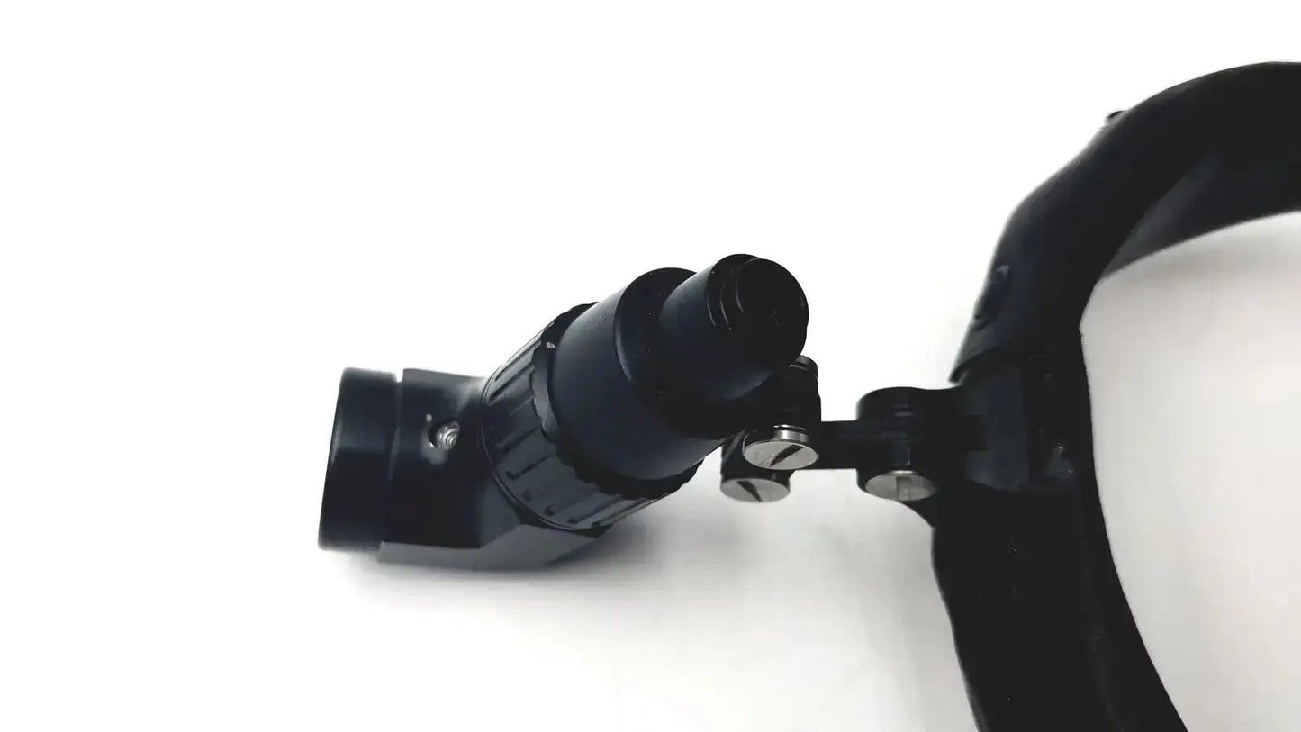 Black adjustable surgical headlight assy with articulated arm and lens assembly by Welch Allyn for surgical use