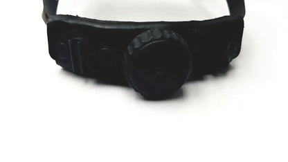 Black rubber surgical headlight assy headband with textured knob and molded side details by Welch Allyn
