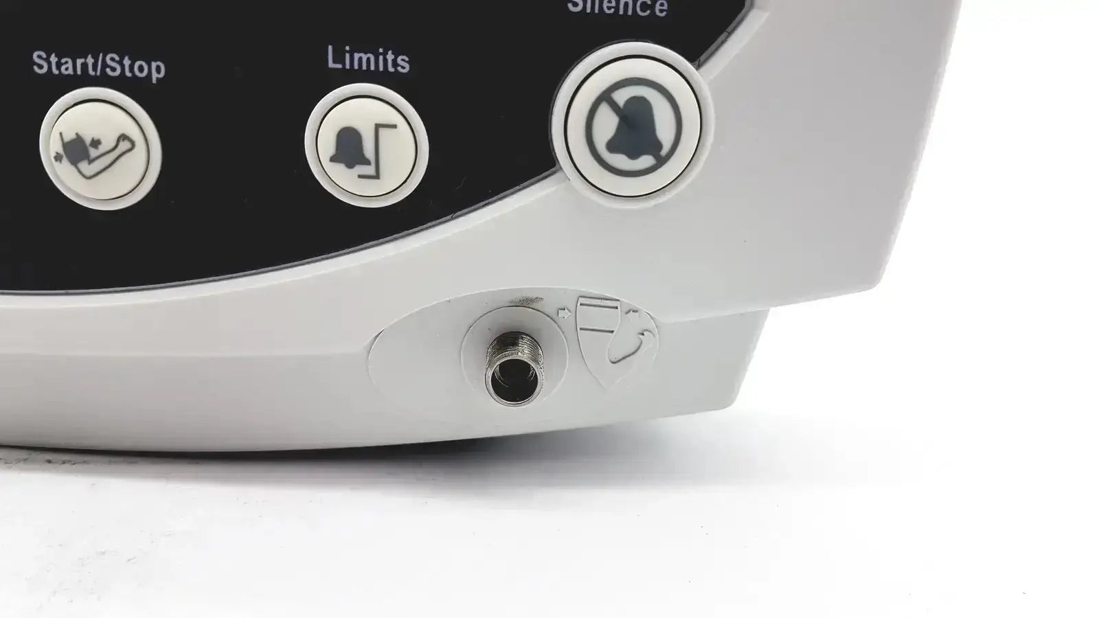 White plastic welch allyn 53000 series vital signs monitor with three circular buttons for start stop limits and silence