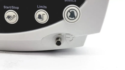 White plastic welch allyn 53000 series vital signs monitor with three circular buttons for start stop limits and silence